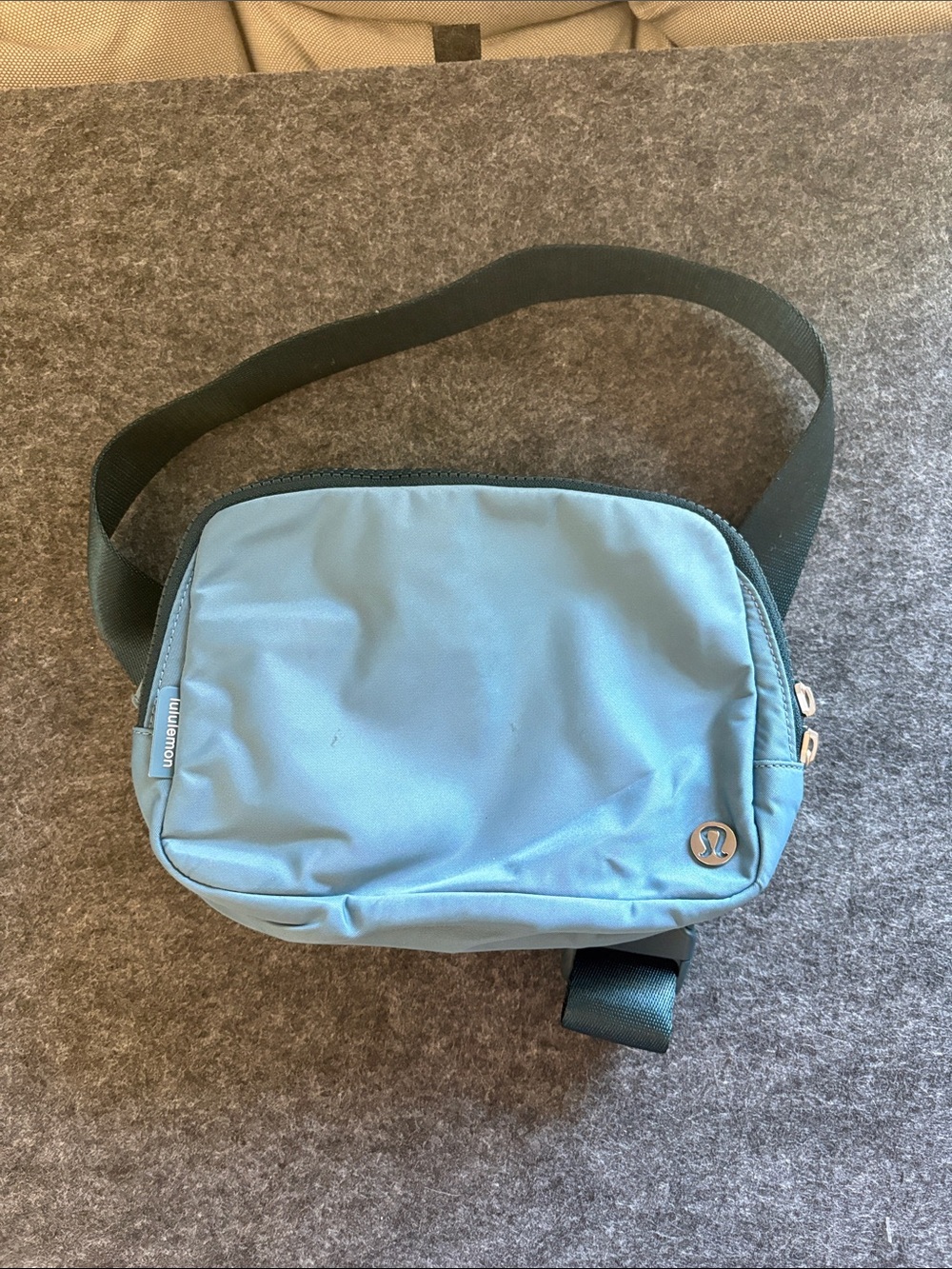 lululemon athletica light teal belt bag with black strap